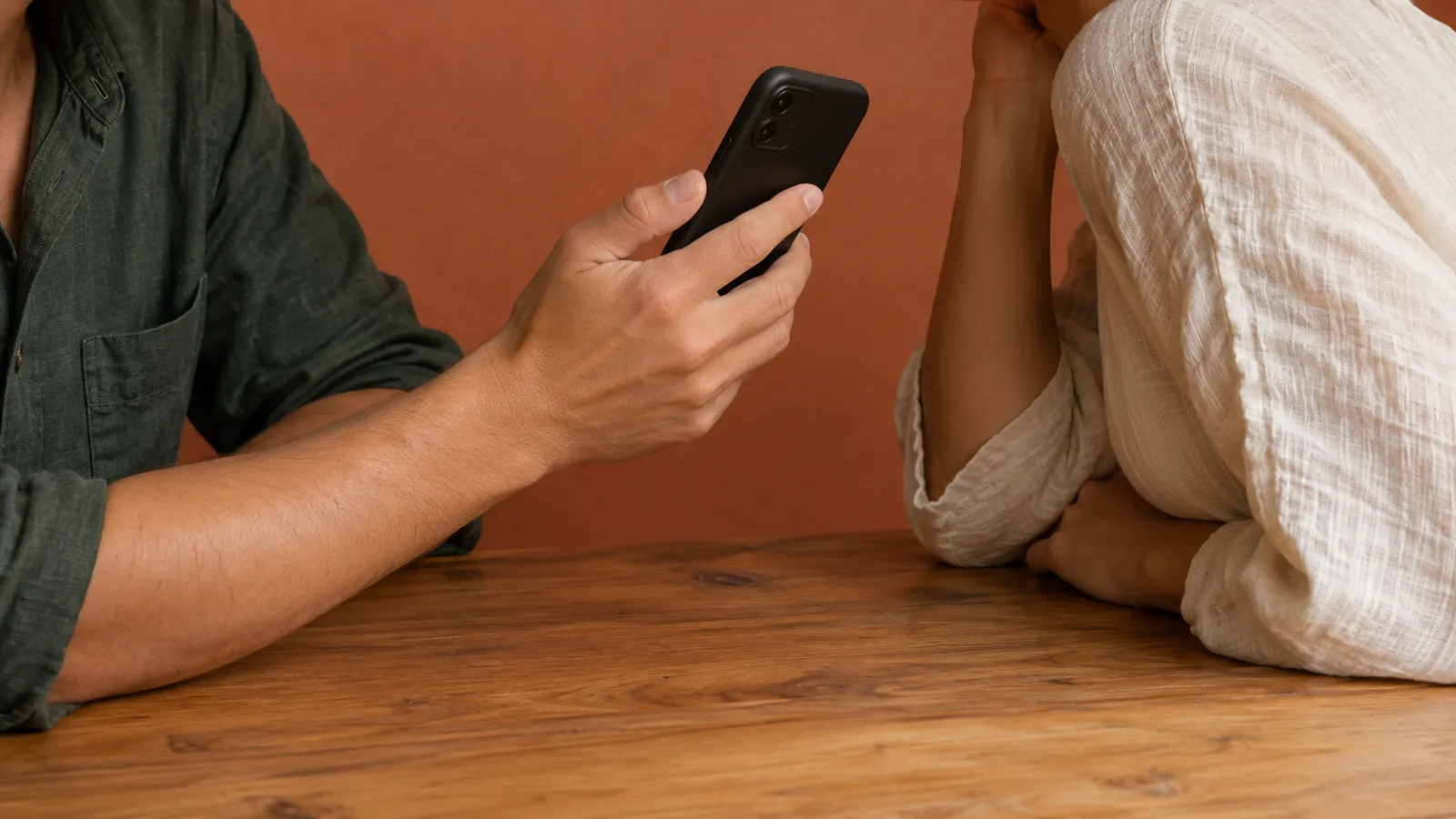 Two people using a phone to support a conversation. AI-generated illustration.